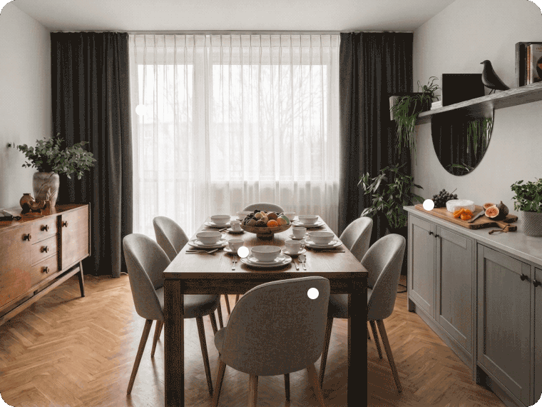 A living room photograph with the MyRegistry extension adding a mid-century teak credenza from Etsy to a gift list
